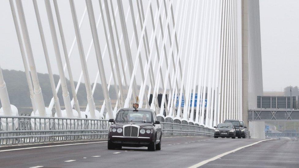 The royals drive on the bridge