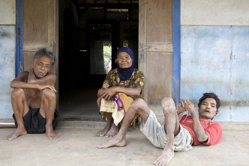 Campret with his mother and father who is blind