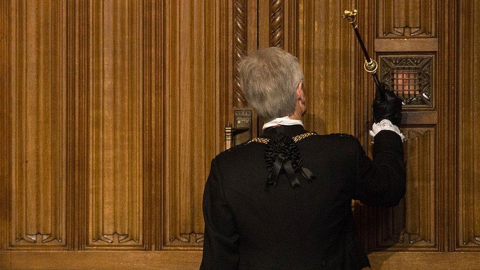 Black Rod knocking on the door to the House of Commons chamber