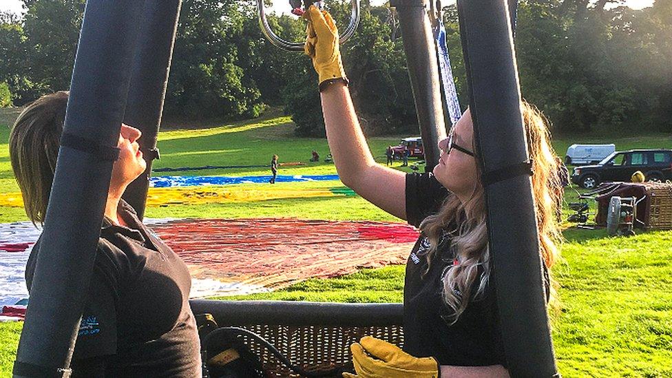 Alyssa Pitt in a hot air balloon basket