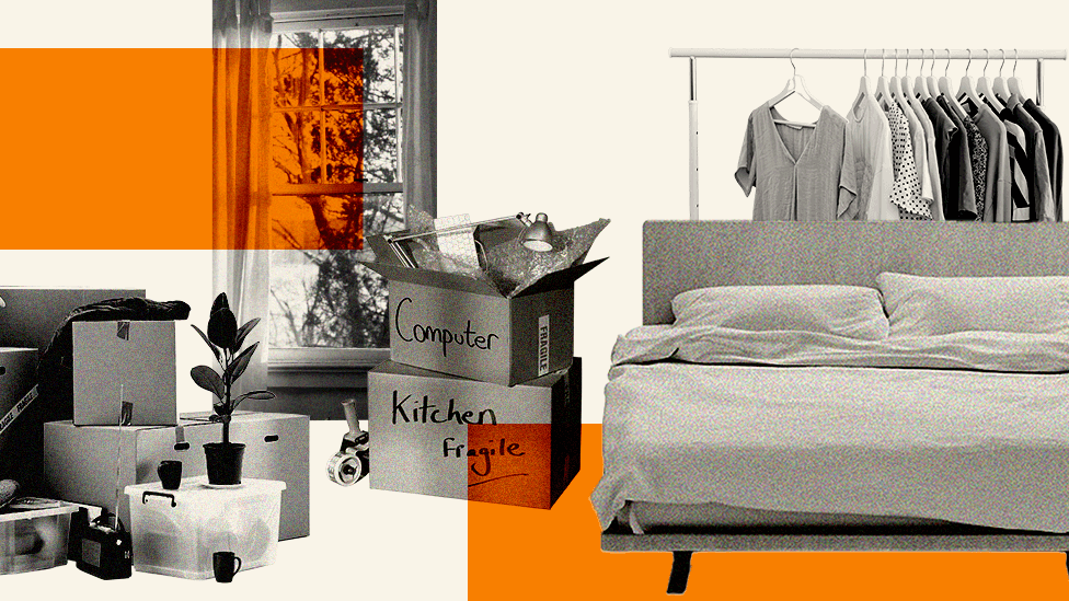 An illustration of a bedroom piled with storage boxes