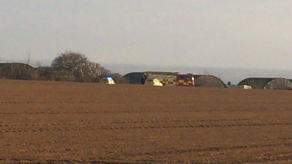 Fire and police vehicles at the scene