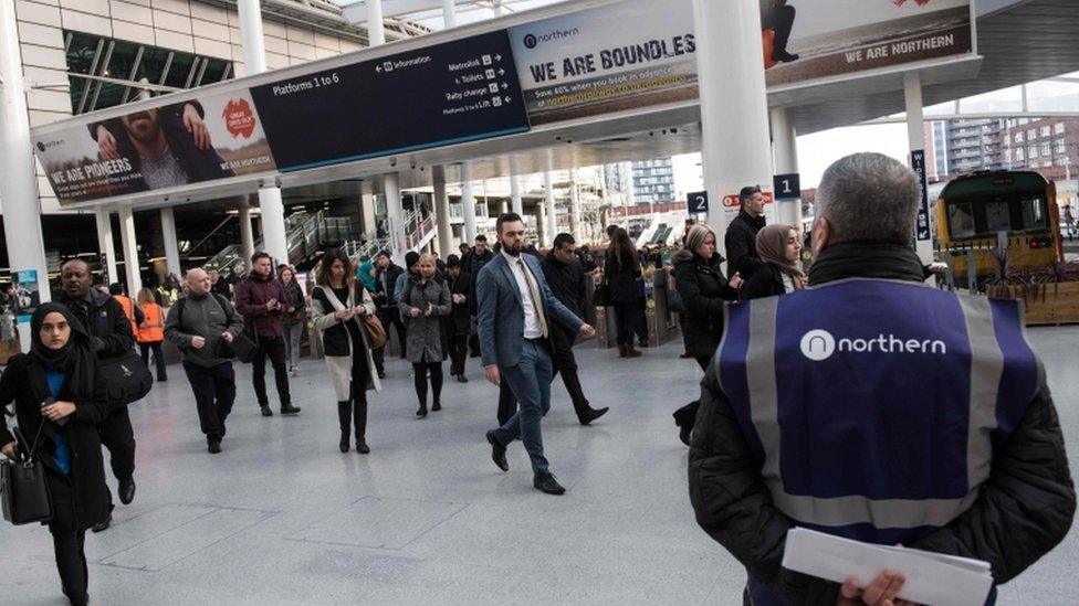 Rail passengers at Manchester Victoria train station