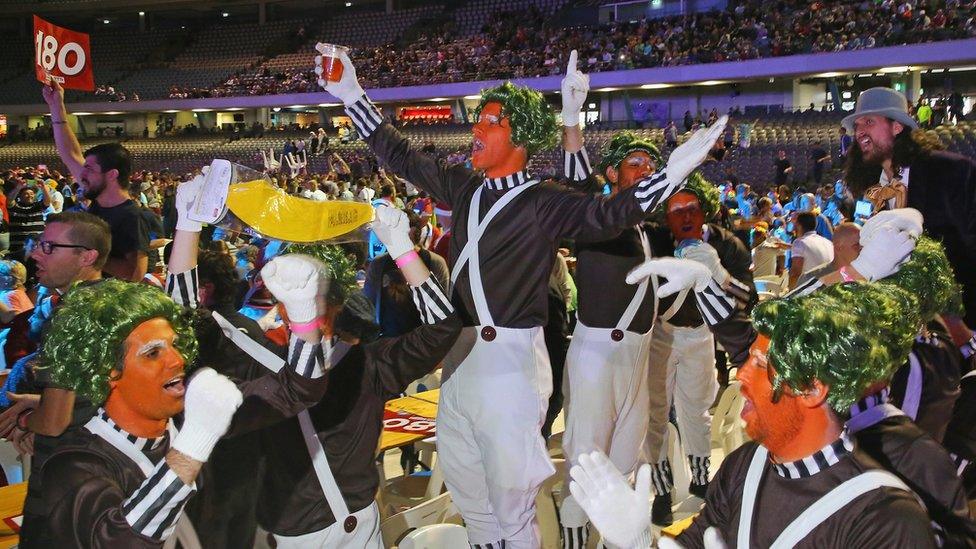 Spectators in fancy dress at Invitational Darts Challenge in Melbourne, Australia in January 2015