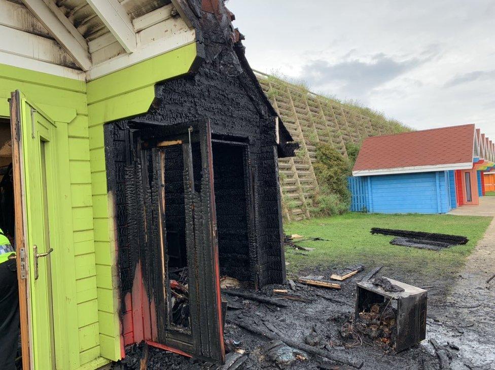 Burnt down beach hut