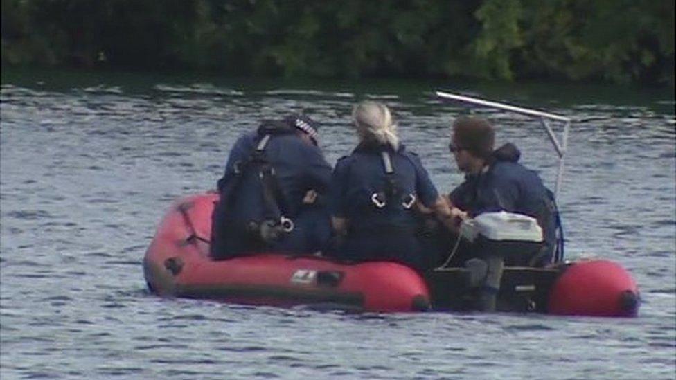 Police officers search Fairlop Waters