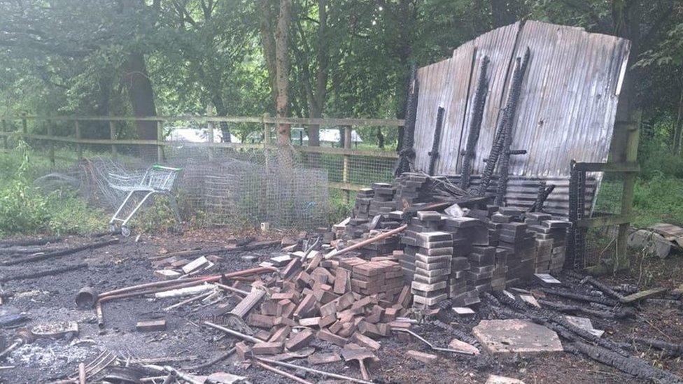 destroyed tool shed