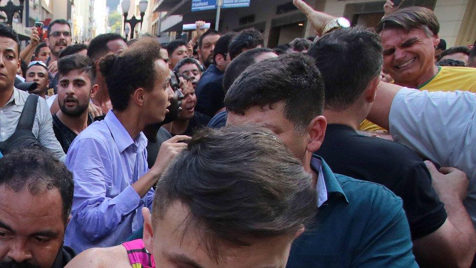 Jair Bolsonaro grimaces after being stabbed in the stomach in Juiz de Fora, Minas Gerais State, on September 6, 2018.