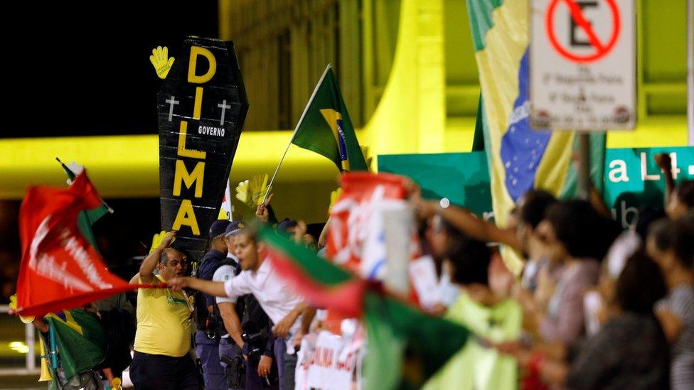 Supporters of Brazil's President Dilma Rousseff take part in a demonstration calling against her impeachment, alongside demonstrators calling for her impeachment in Brasilia, Brazil, 10th May 2016.