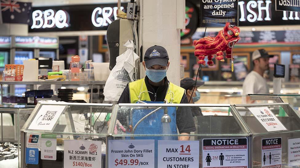 Fish market worker