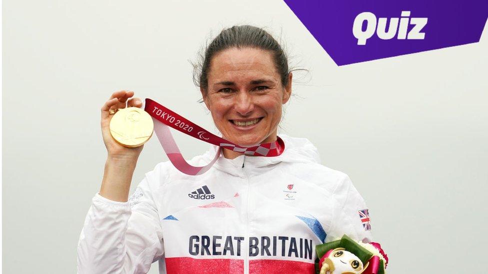 Sarah Storey holding medal