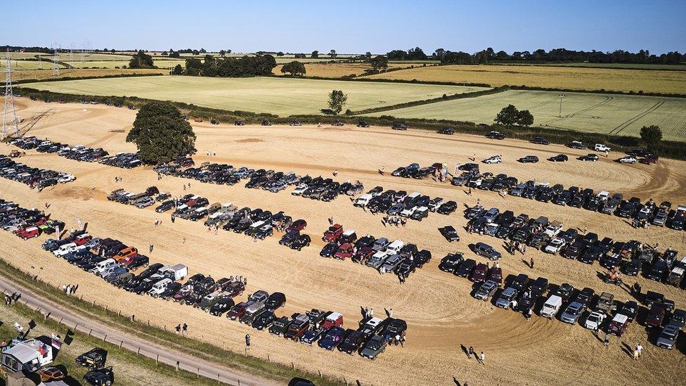 Parade of Land Rovers and Range Rovers at the Billing Off Road Show near Northampton.