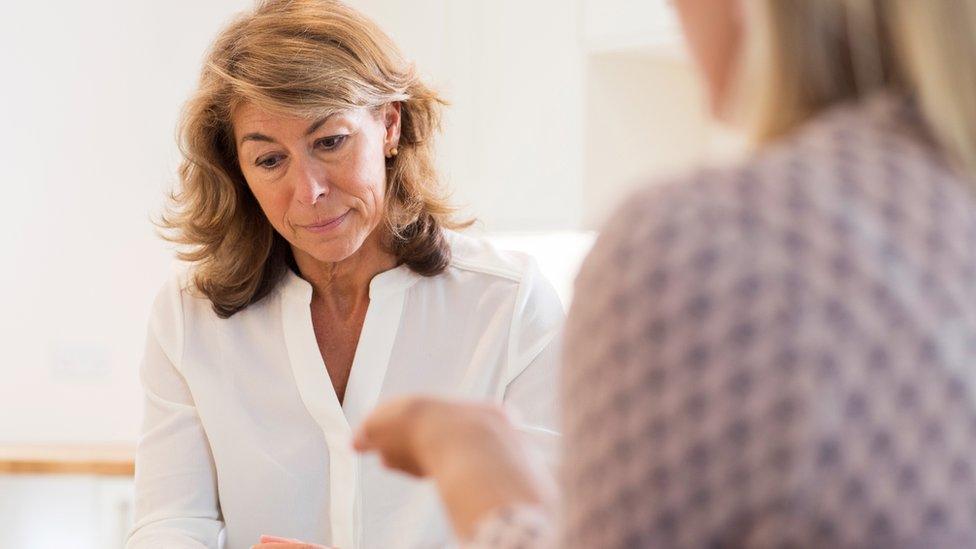 A woman receiving counselling