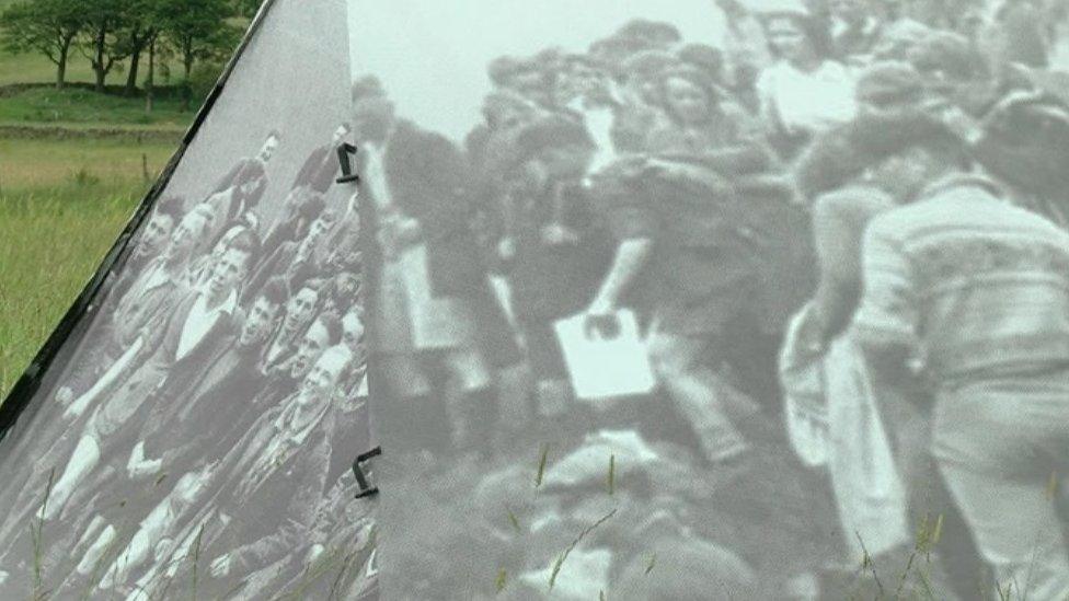 Tents with the images of the Kinder protestors