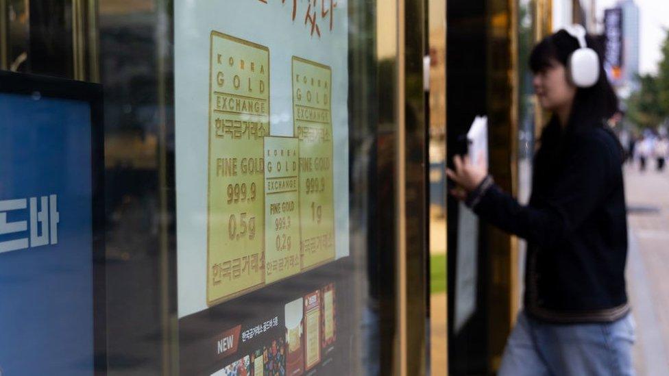 An advertisment for gold bars at the Korea Gold Exchange store in Seoul, South Korea, on Friday, Oct. 13, 2023.