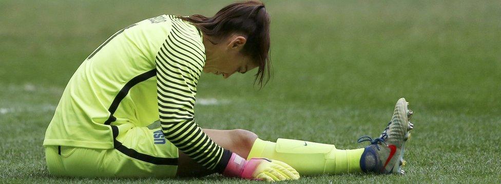 Goalkeeper Hope Solo bent double in despair at the women's football quarter finals in Rio Olympics, 12 August 2016