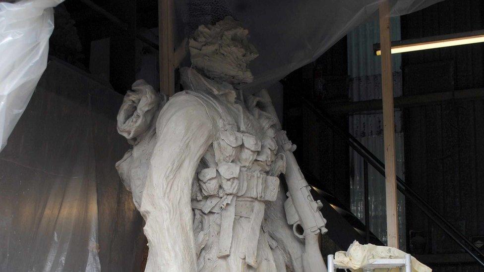 The statue under construction