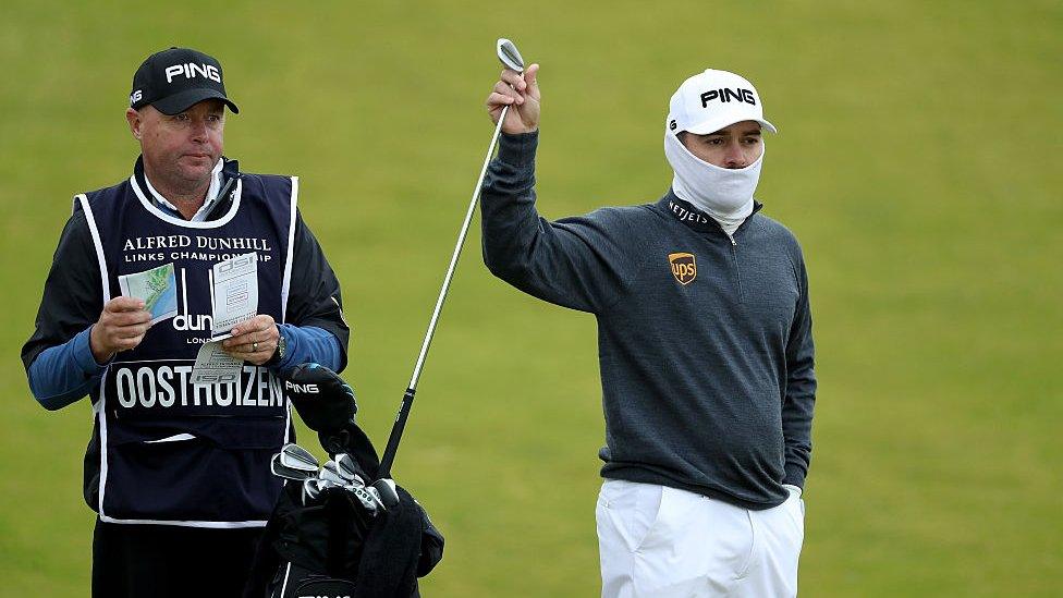 Louis Oosthuizen wearing face scarf