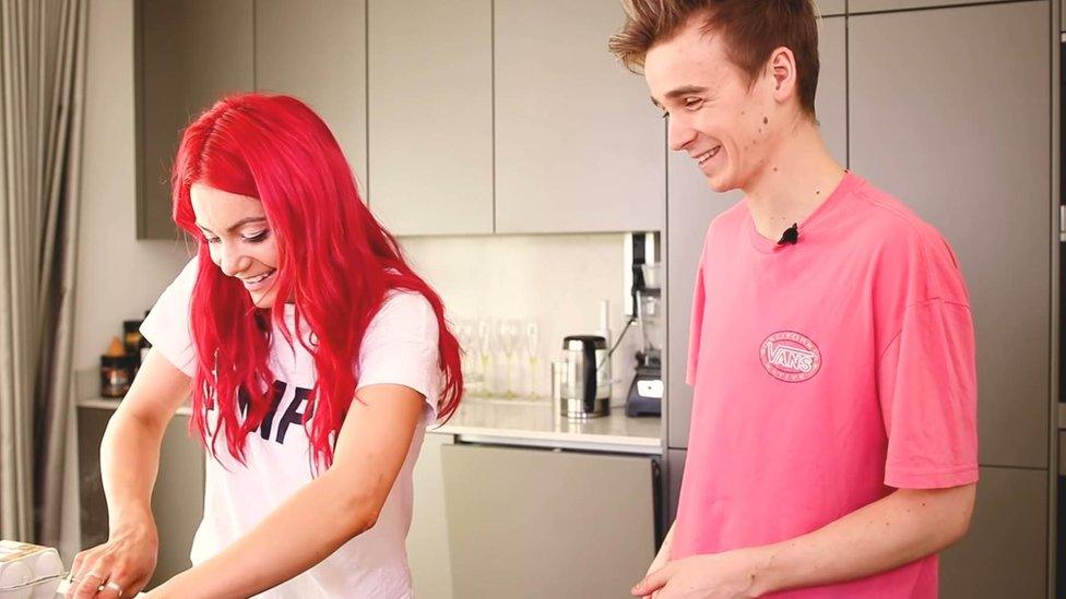 Dianne and Joe prepping food in kitchen