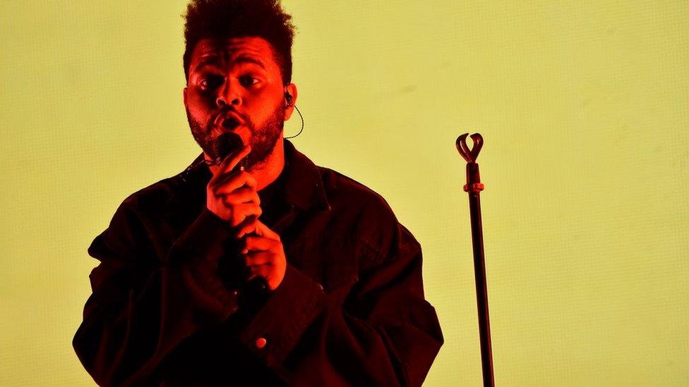 The Weeknd performing