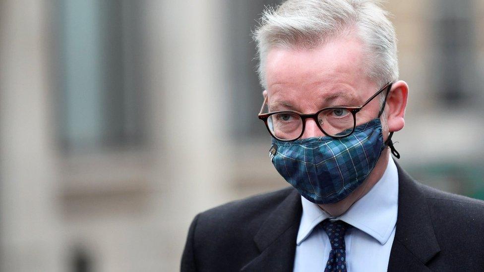 Michael Gove in a tartan mask