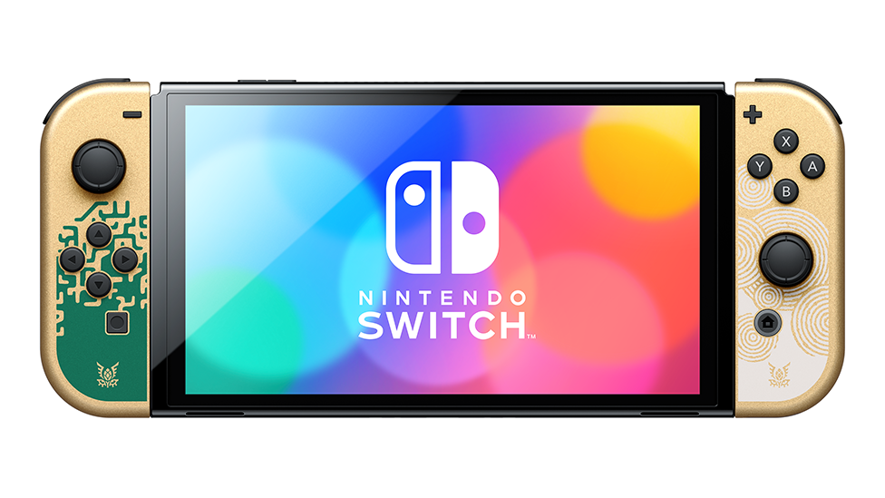 A Nintendo Switch console against a white background. The screen displays the words "Nintendo Switch" and two icons representing the console's detachable controllers against a background of colorful circles creating a rainbow effect. The console's controllers are gold and printed with green and white patterns to represent the Legend of Zelda game series.