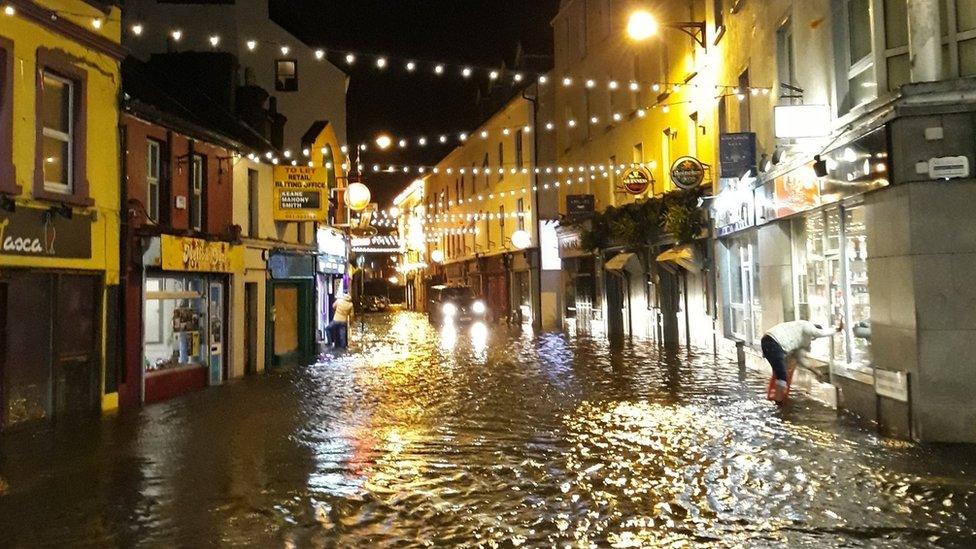 The storm has also hit Ireland - this Christmassy street in Galway was flooded.