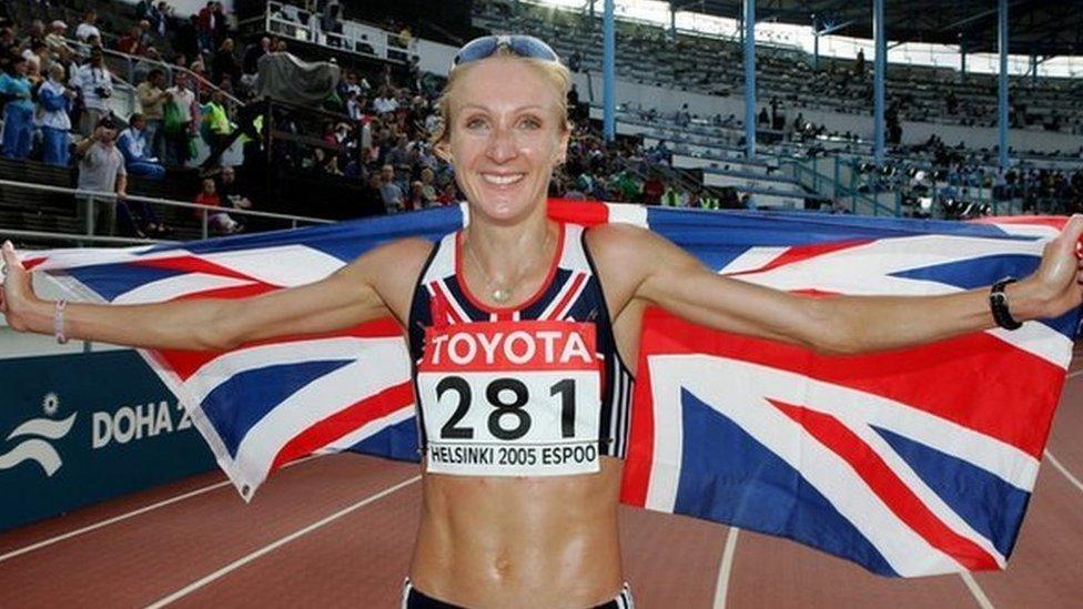 Paula Radcliffe celebrates victory in the marathon at the 2005 World Championships