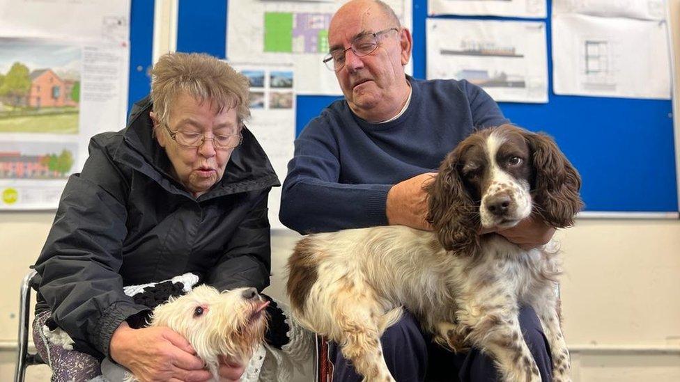 Kathleen and Bob Greenberry with Parson’s Terrier Bella and Poppy, a Springer Spaniel