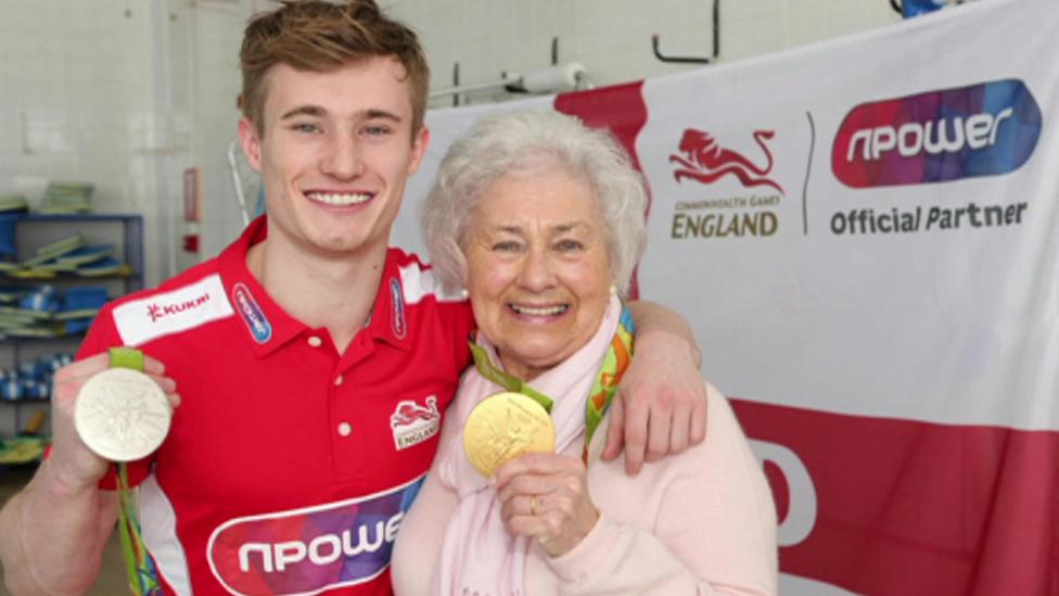 Jack Laugher and Sylvia Grice holding Olympic medals