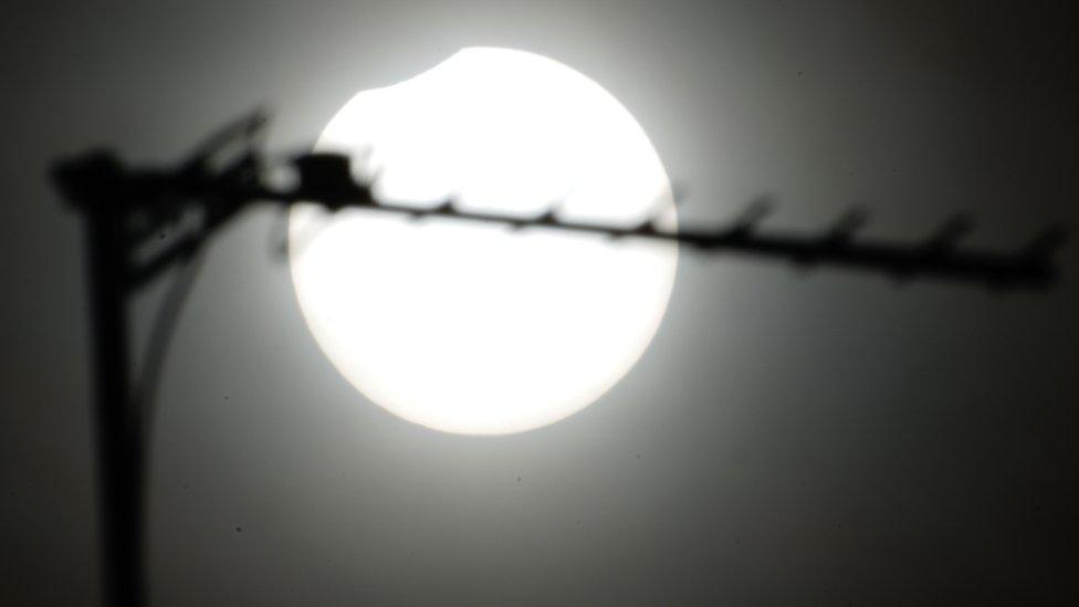 A partial solar eclipse visible over Bristol