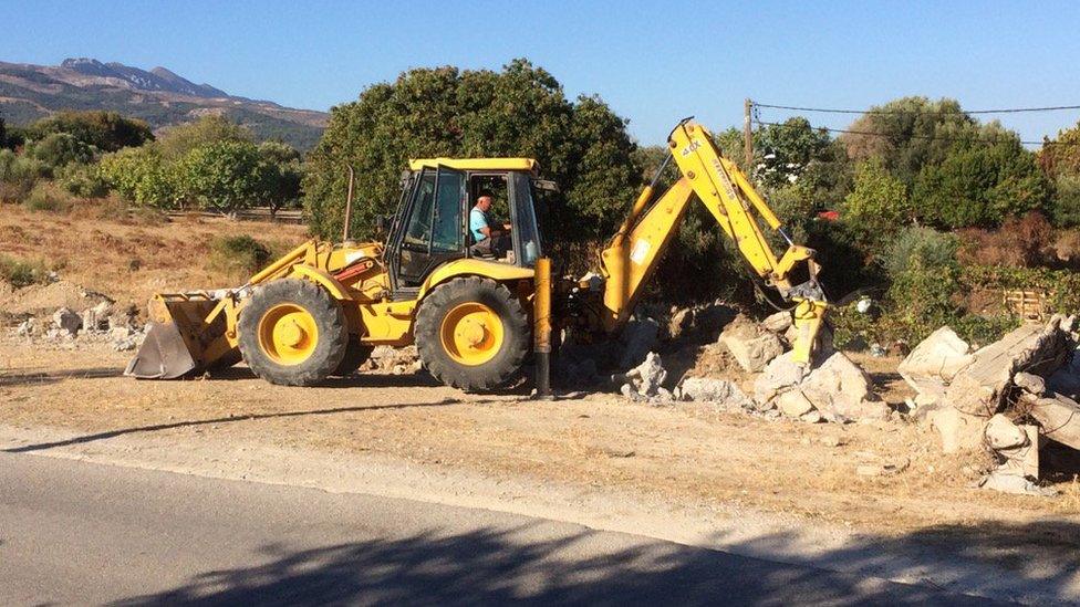 Man inside a digger machine