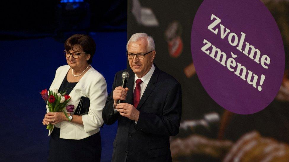 Presidential candidate Jiri Drahos speaks next to his wife Ewa after being defeated in the presidential election in Prague, Czech Republic, January 27, 2018.