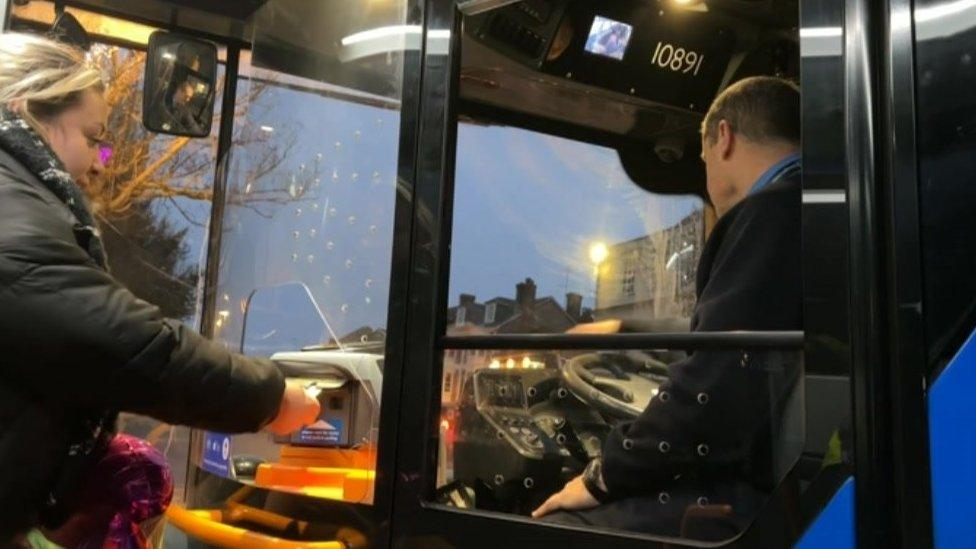 Mr Freeman driving a bus