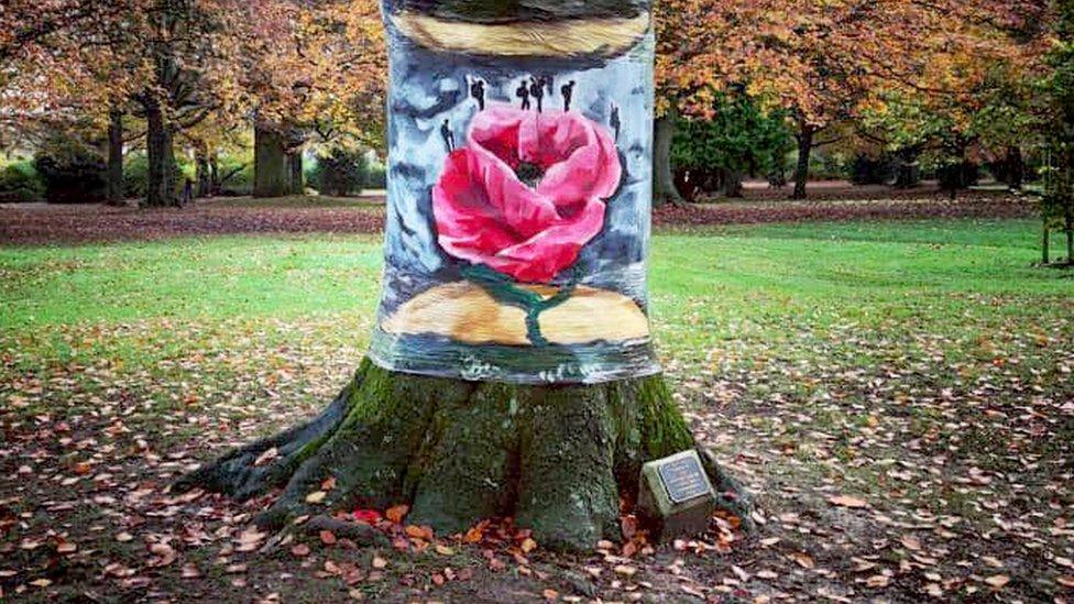 A soldier painted on a tree