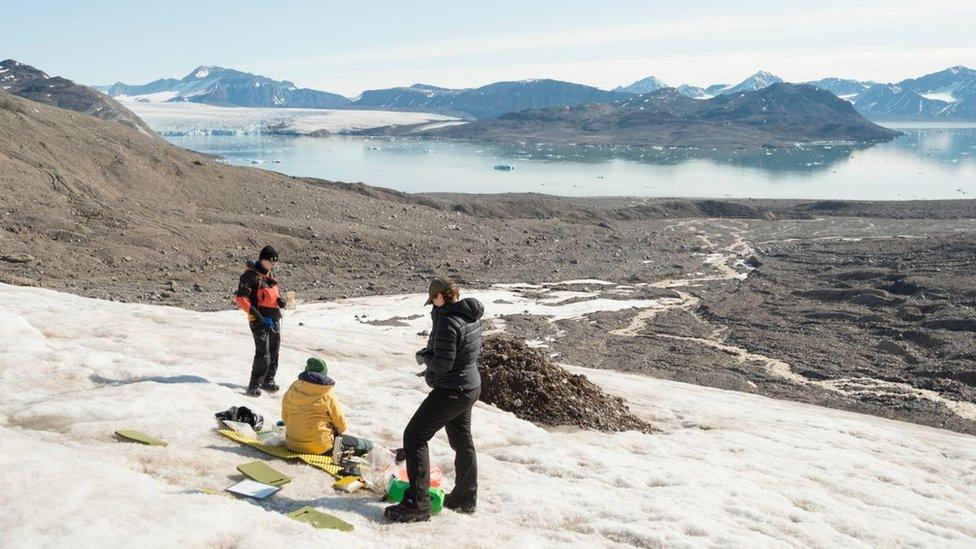 Emily Broadwell with fellow members of the Microlab team in snowy mountains