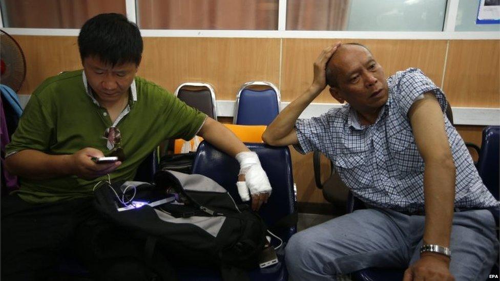 Injured tourists await treatment at the Police Hospital in Bangkok