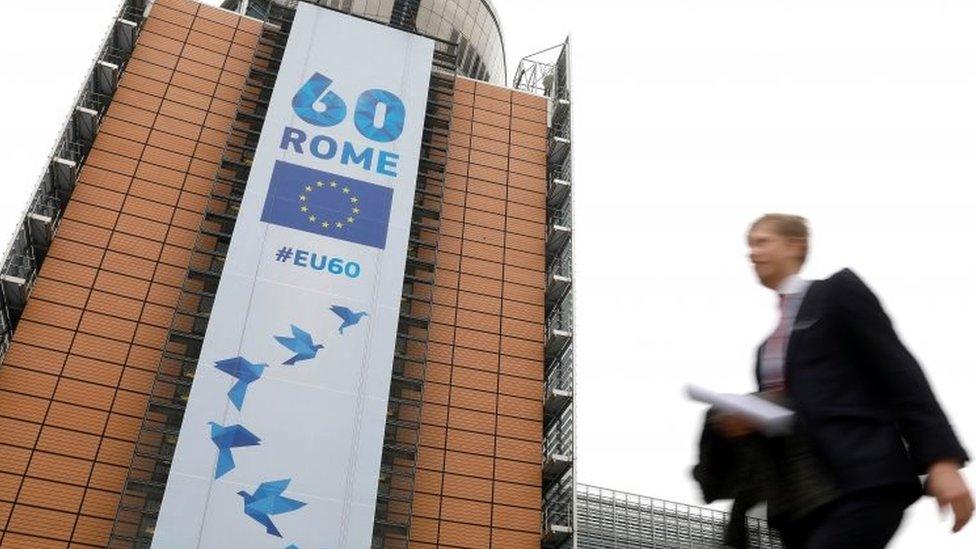 A banner marking the 60 years of the singing of the Treaty of Rome is displayed at the European Commission headquarters in Brussels. Photo: 20 March 2017