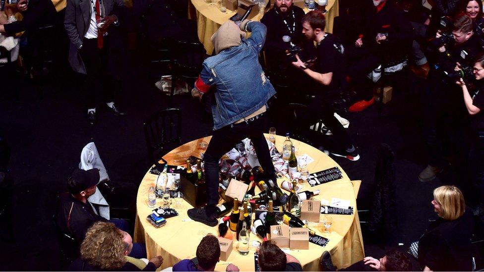 Oil Sykes of Bring Me The Horizon on Coldplay's table