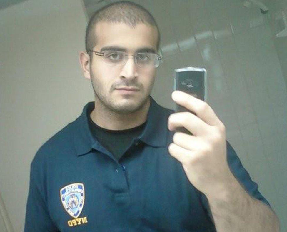 Undated photo of Omar Mateen wearing a t-shirt with NYPD emblem