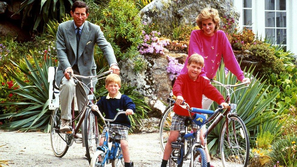 Prince and Princess of Wales with sons Prince William, right, and Prince Harry prepare for a cycling trip