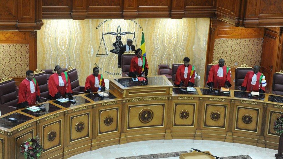 President of Gabonese Constitutional Court Marie-Madeleine Mborantsuo (C) takes her seat ahead of hearing in Libreville on September 22, 2016.