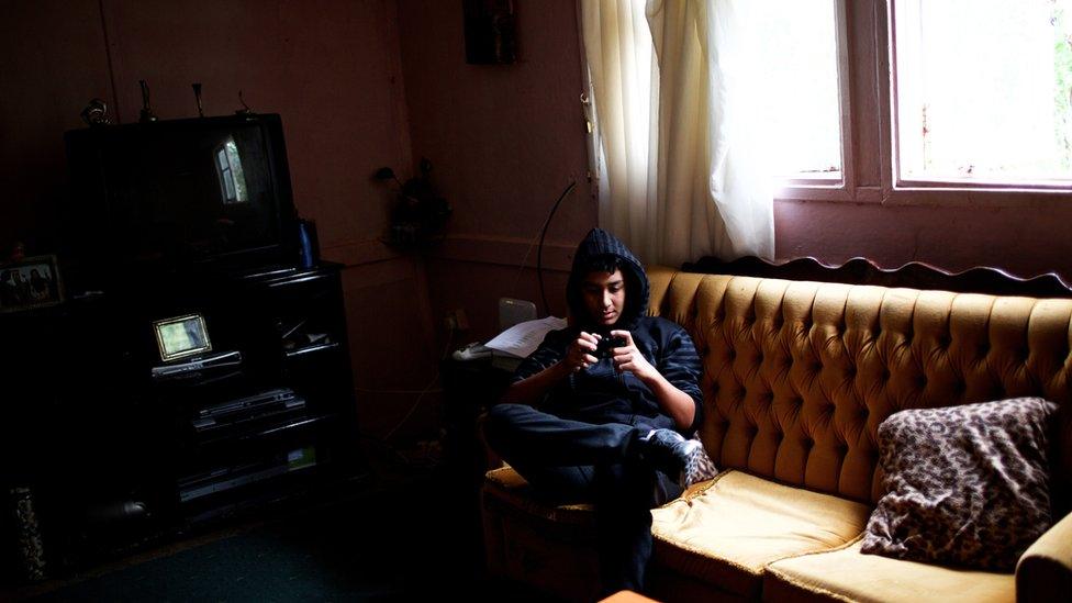 young man on sofa