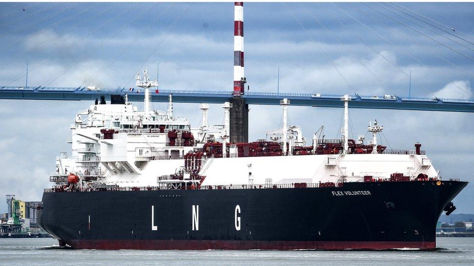 The LNG tanker Flex Volunteer, cruises near the Saint-Nazaire bridge over the Loire estuary, on April 12, 2022.