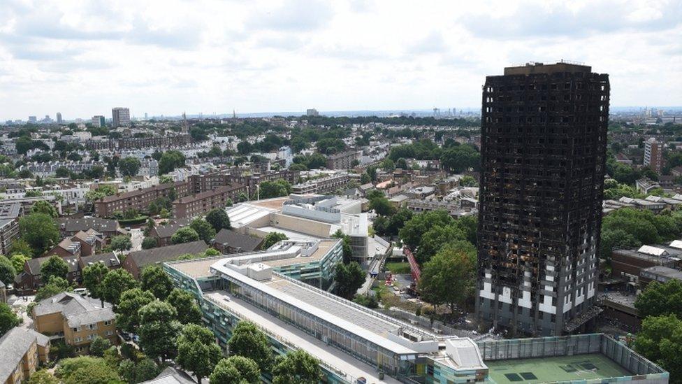 Exterior view of charred outer walls of the burnt out shell of the Grenfell Tower