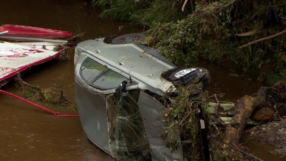 Cars rescued from river