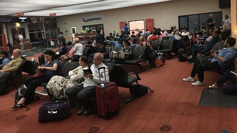 Passengers at the Alice Springs terminal