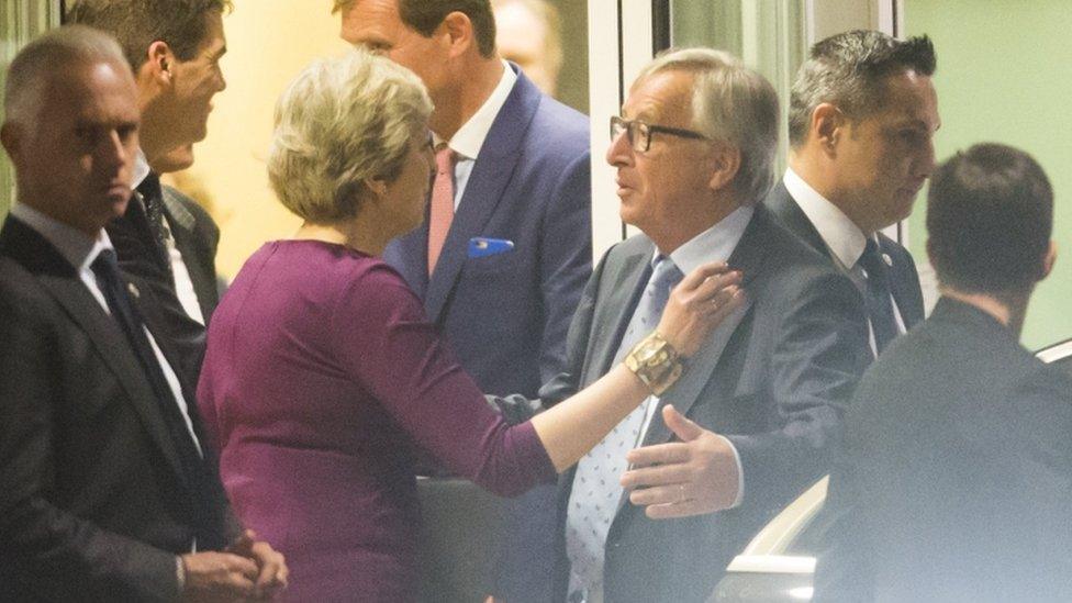 British Prime Minister Theresa May with EU Commissioner President Jean-Claude Juncker at the end of a Brexit meeting in Brussels, Belgium, 16 October 2017