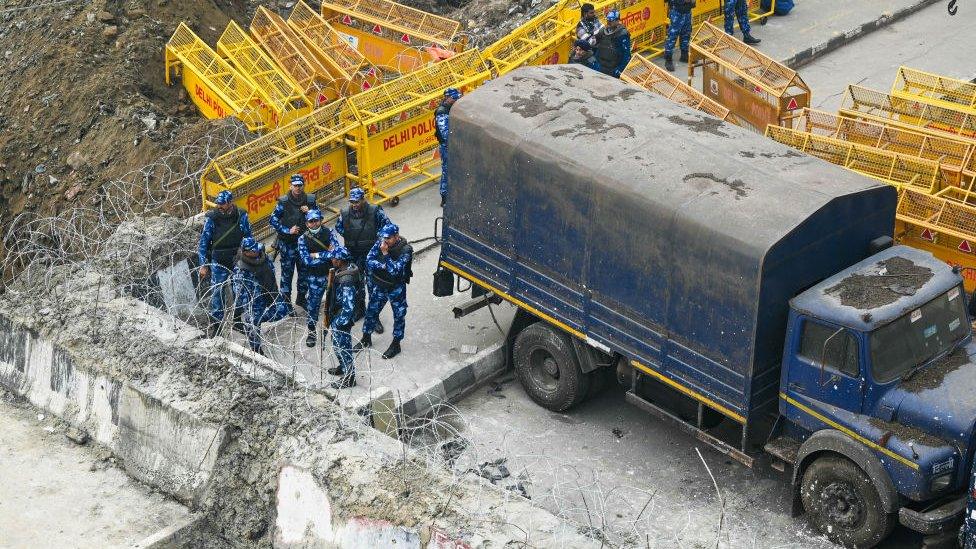 Paramilitary personnel barricading one of Delhi's borders