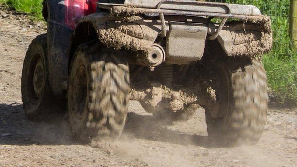 Quad bike farmer